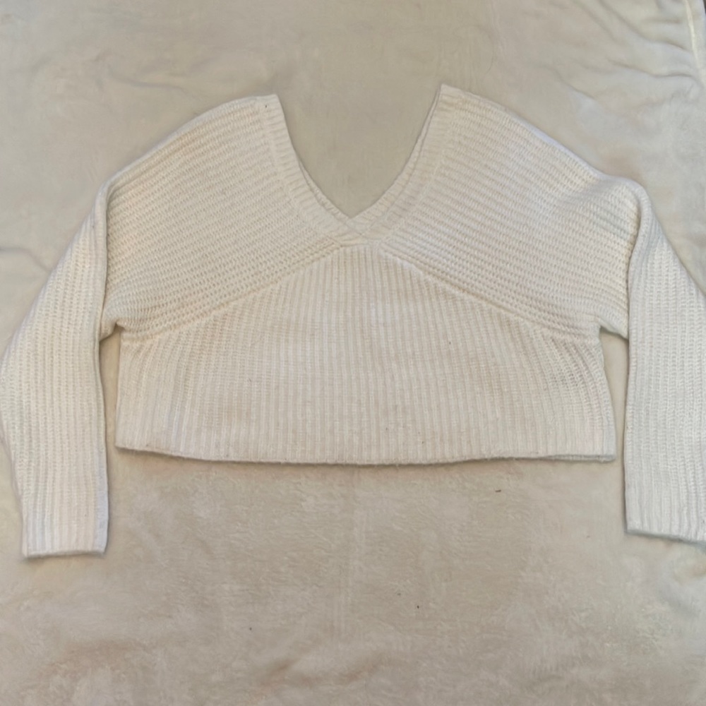 Cropped white v neck sweater
